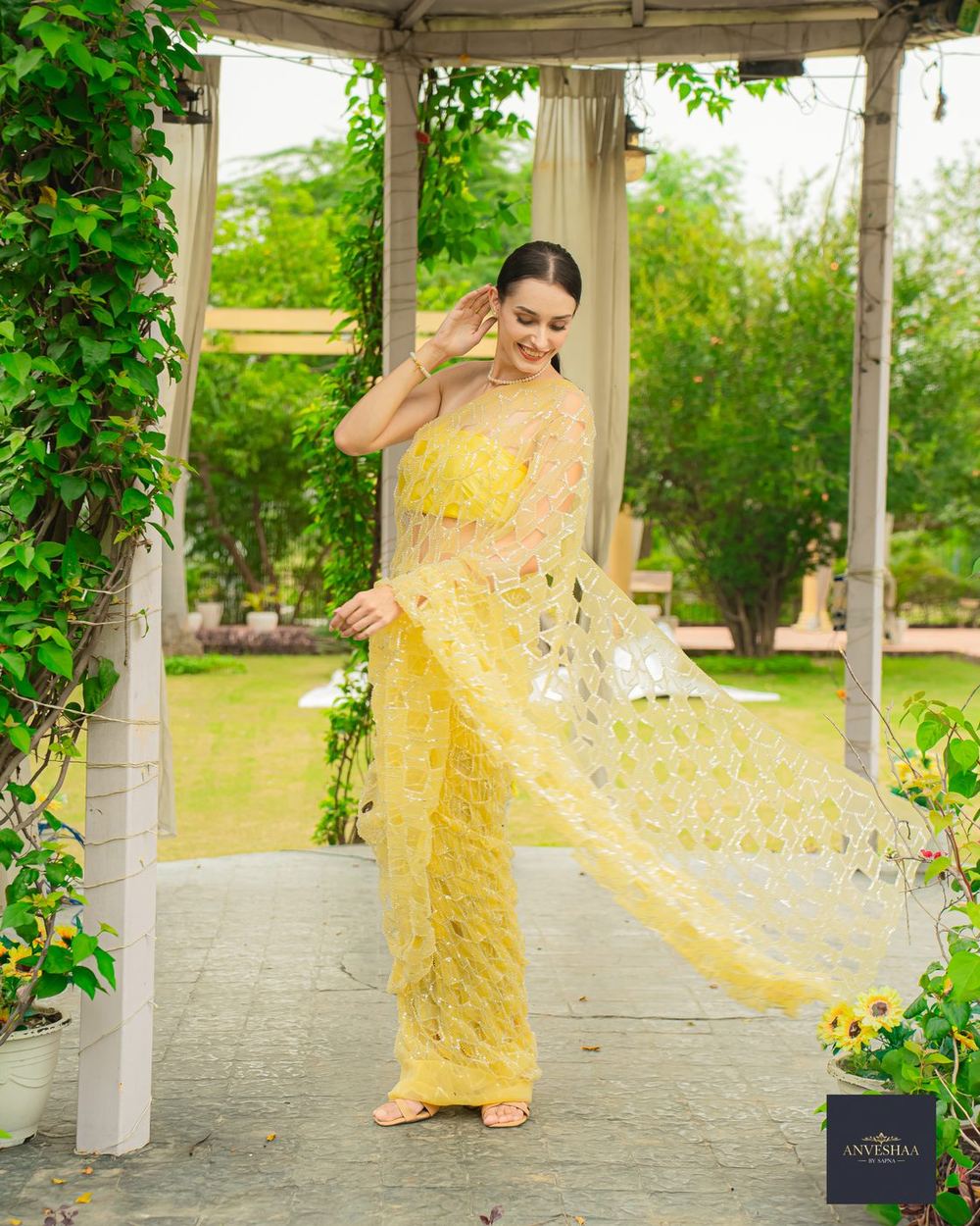 Marigold pearl cutwork net saree