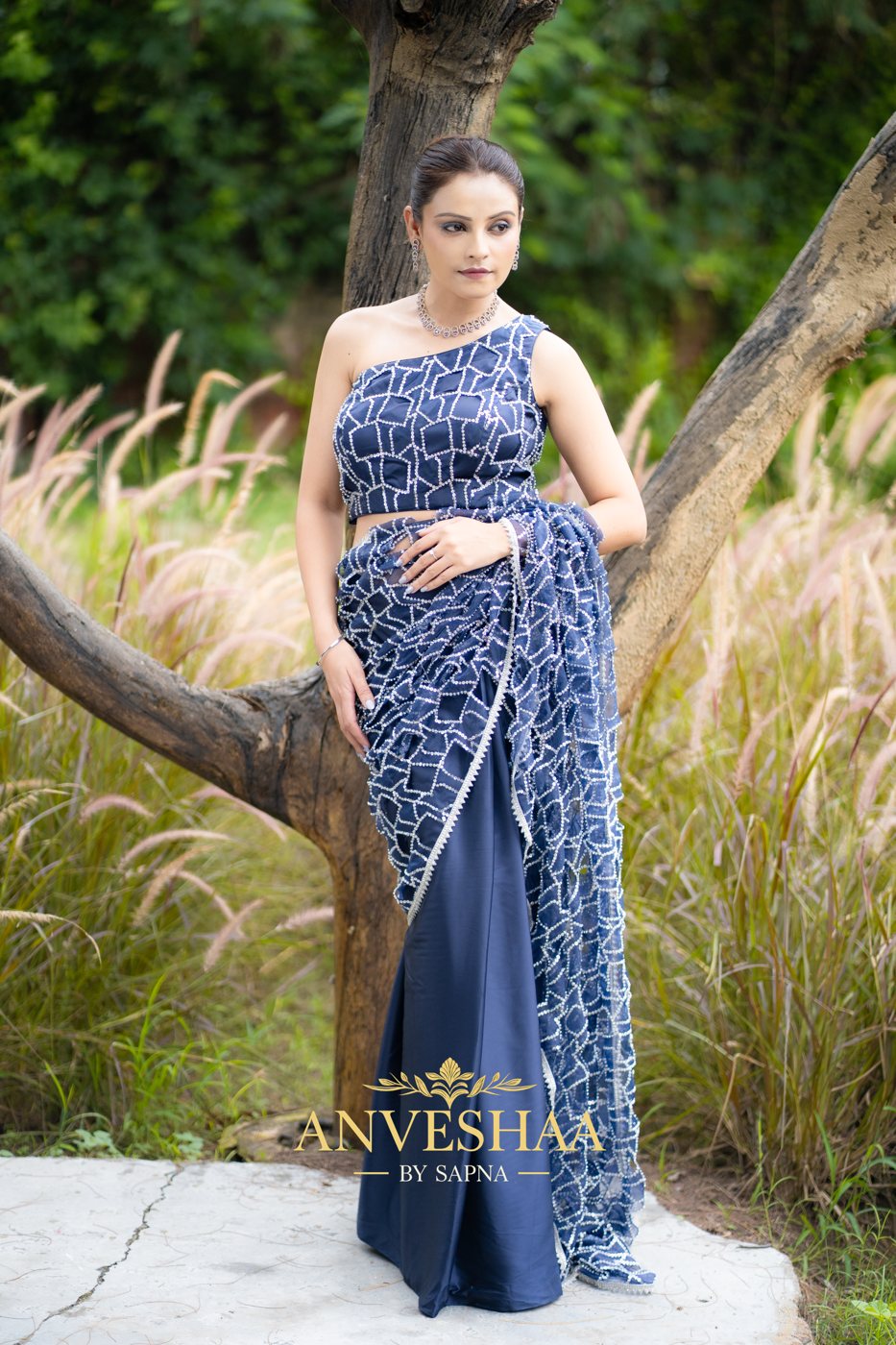 Sapphire embroidered one-shoulder gown, front